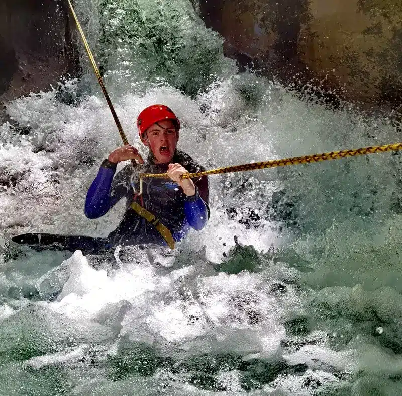 Canyoning through fast water in Hrcavka Canyon Sutjeska National Park Bosnia
