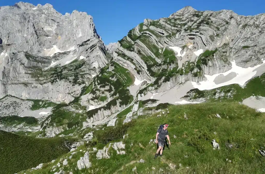 Rocky hiking trail leading toward Bobotov Kuk summit