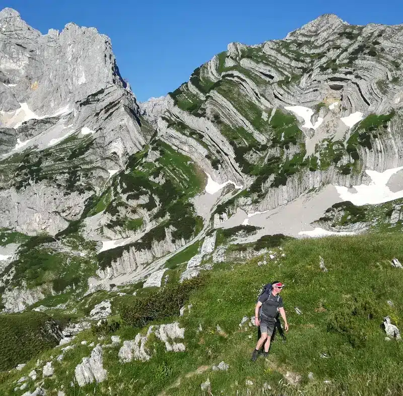 Rocky hiking trail leading toward Bobotov Kuk summit
